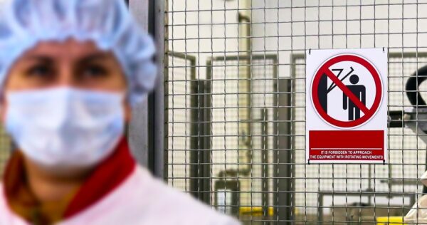 production of cheese using robots, warning sign