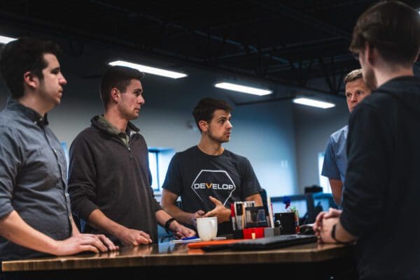 Team DEVELOP collaborating at a workplace