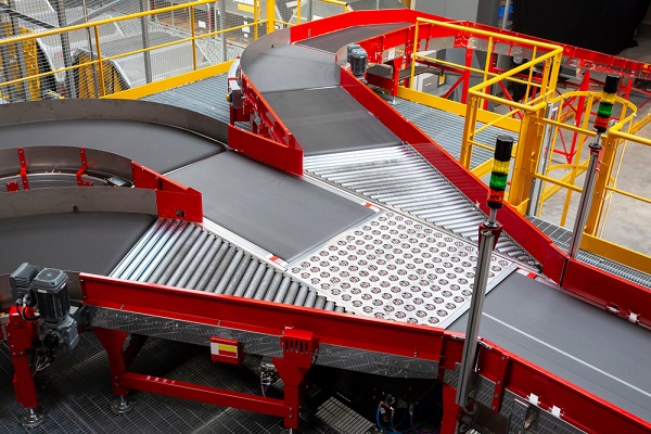 Empty conveyor sorting belt at distribution warehouse