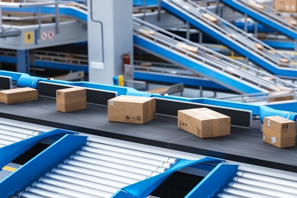 Recyclable Cardboard Box Being Transported on a Conveyor Belt