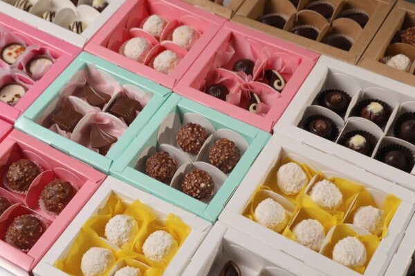 Many delicious candies in boxes