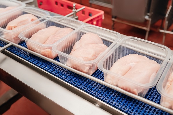 Production line with packaging and cutting of meat