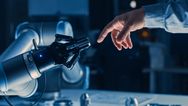 Human hand touchng robot hand